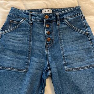 High waisted, wide leg, 4 button jeans by OAT New York.